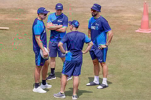Afghanistan Vs New Zealand Test: New Zealand's captain, Tim Southee, left, interacts with teammates